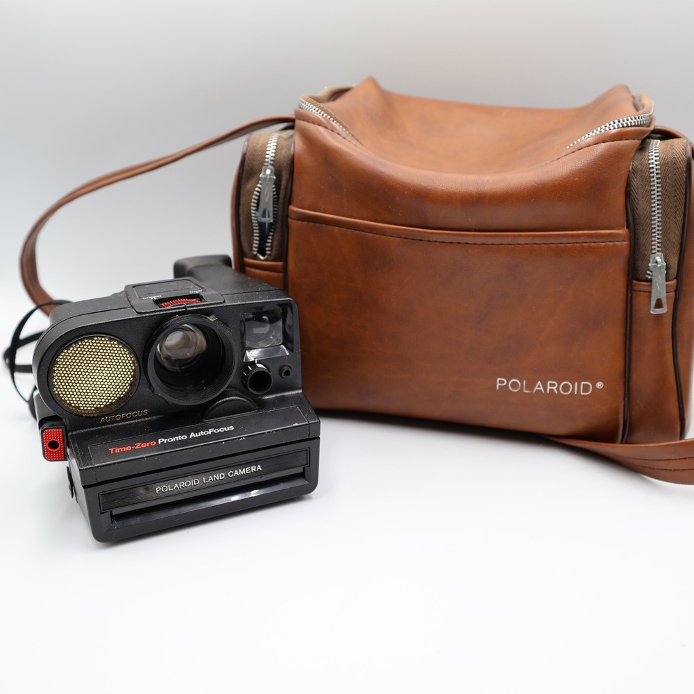 Polaroid Time-Zero Pronto Sonar AutoFocus Land Camera and Case and 10 Flash Bars